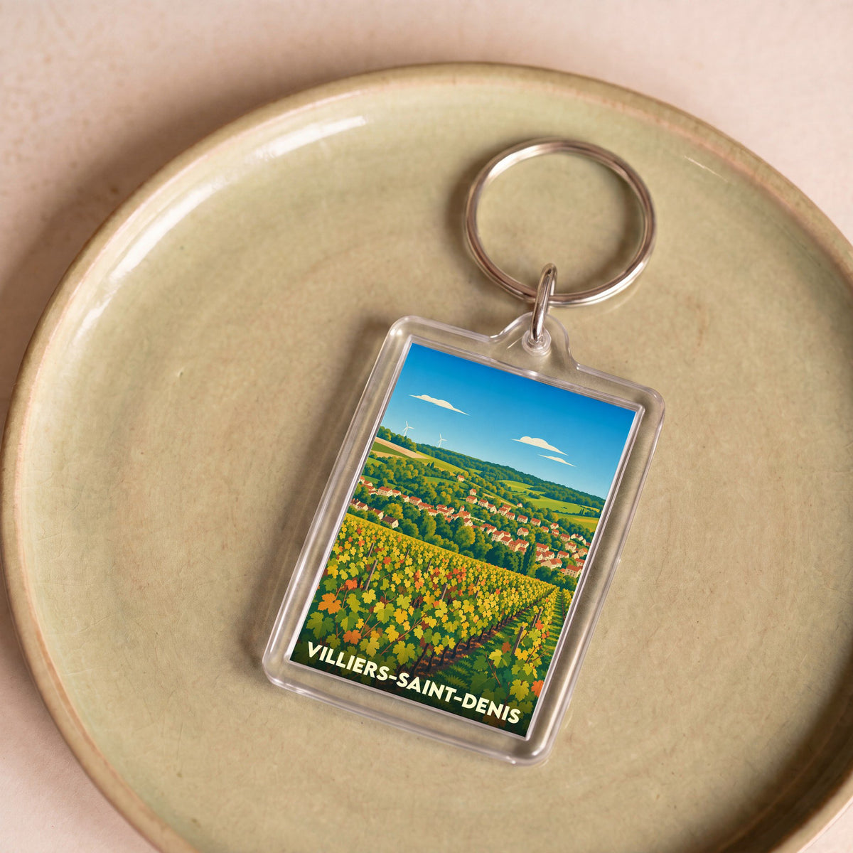 Porte-clés souvenir de la ville de Villiers-Saint-Denis avec une illustration stylisée de ses vignes.
