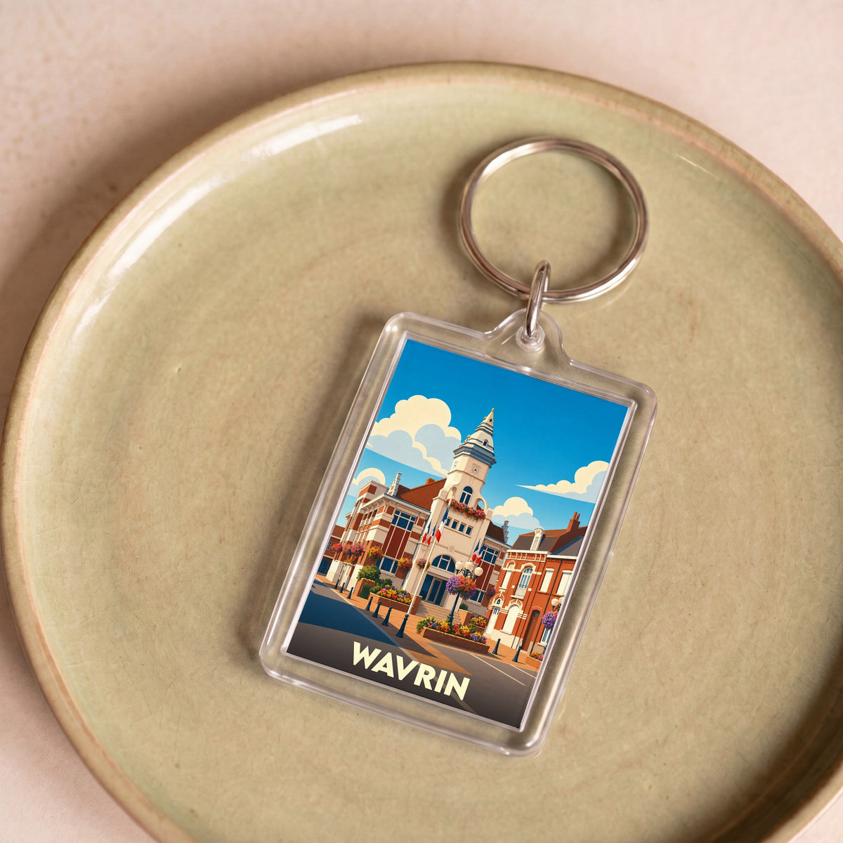 Porte-clés souvenir de la ville de Wavrin avec une illustration stylisée de son hôtel de ville.