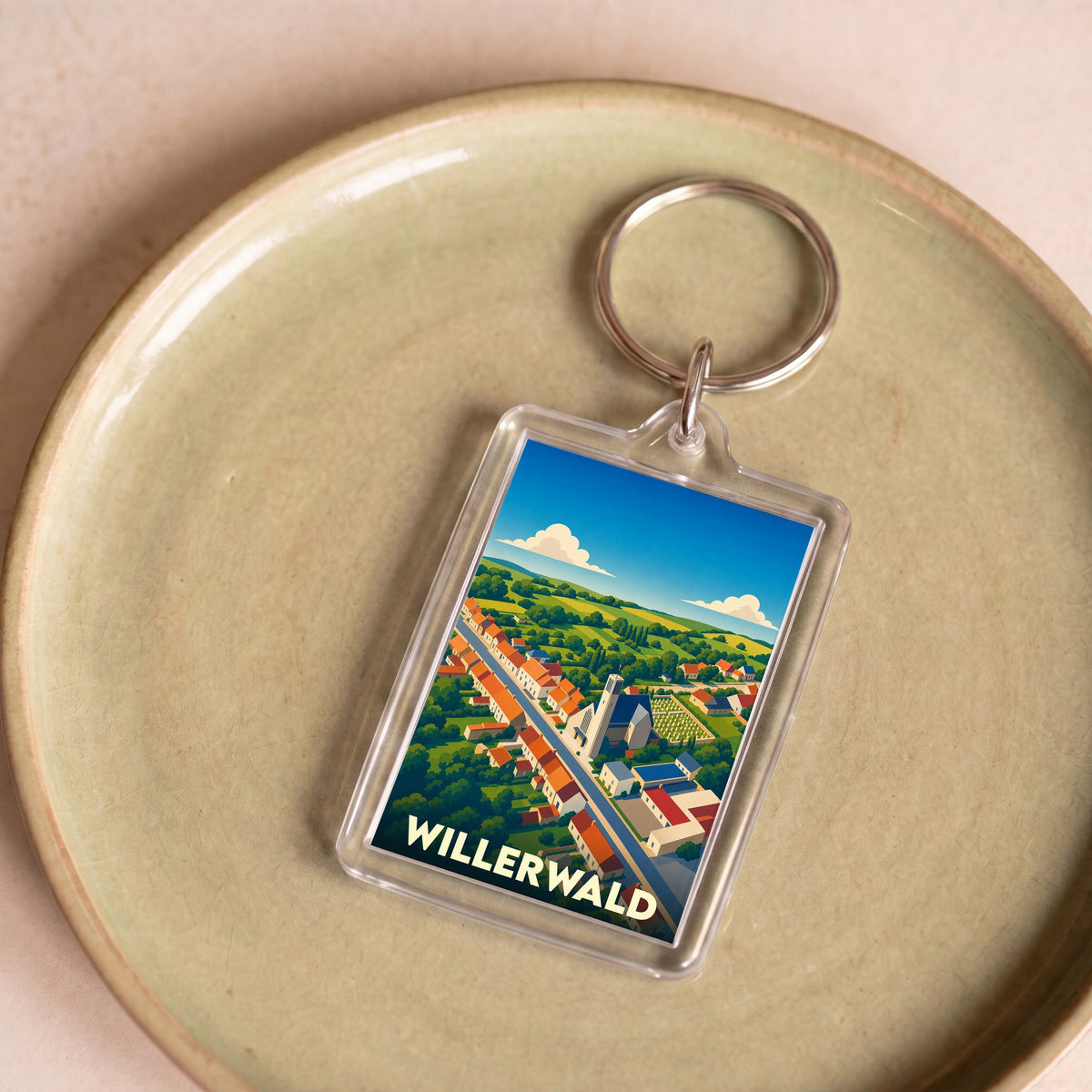 Porte-clés souvenir de la ville de Willerwald avec une illustration stylisée.