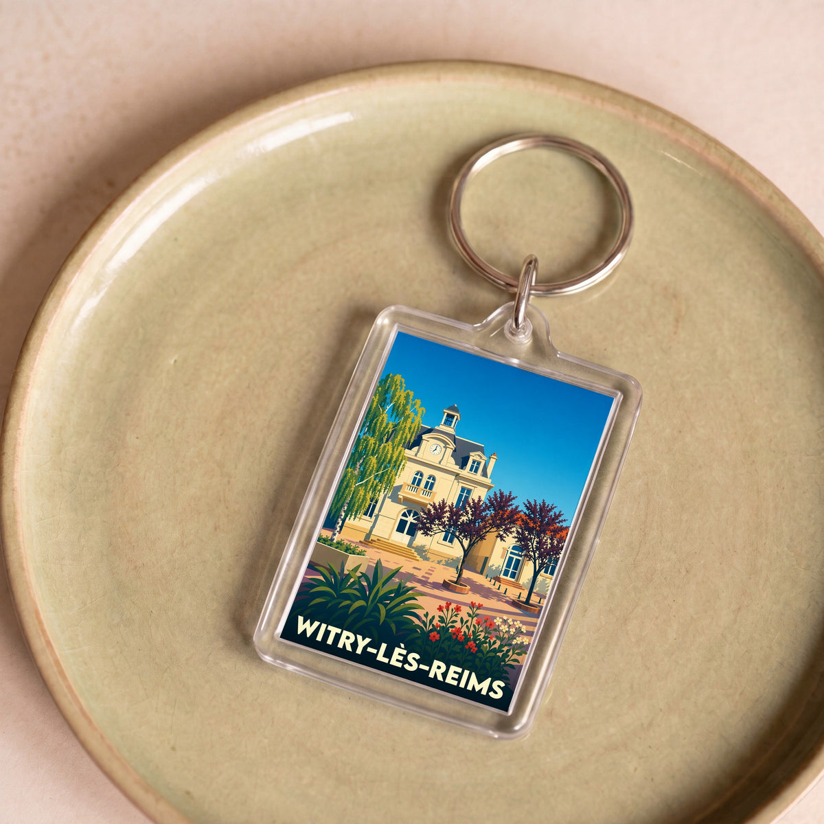 Porte-clés souvenir de la ville de Witry-lès-Reims avec une illustration stylisée de l'hôtel de ville.