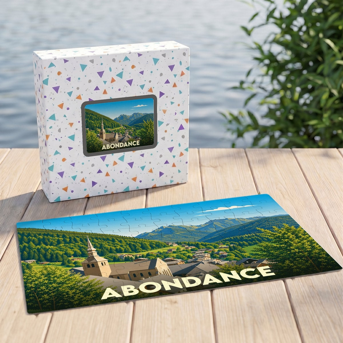 Puzzle souvenir de la ville d'Abondance illustrant un paysage de montagne avec son église.