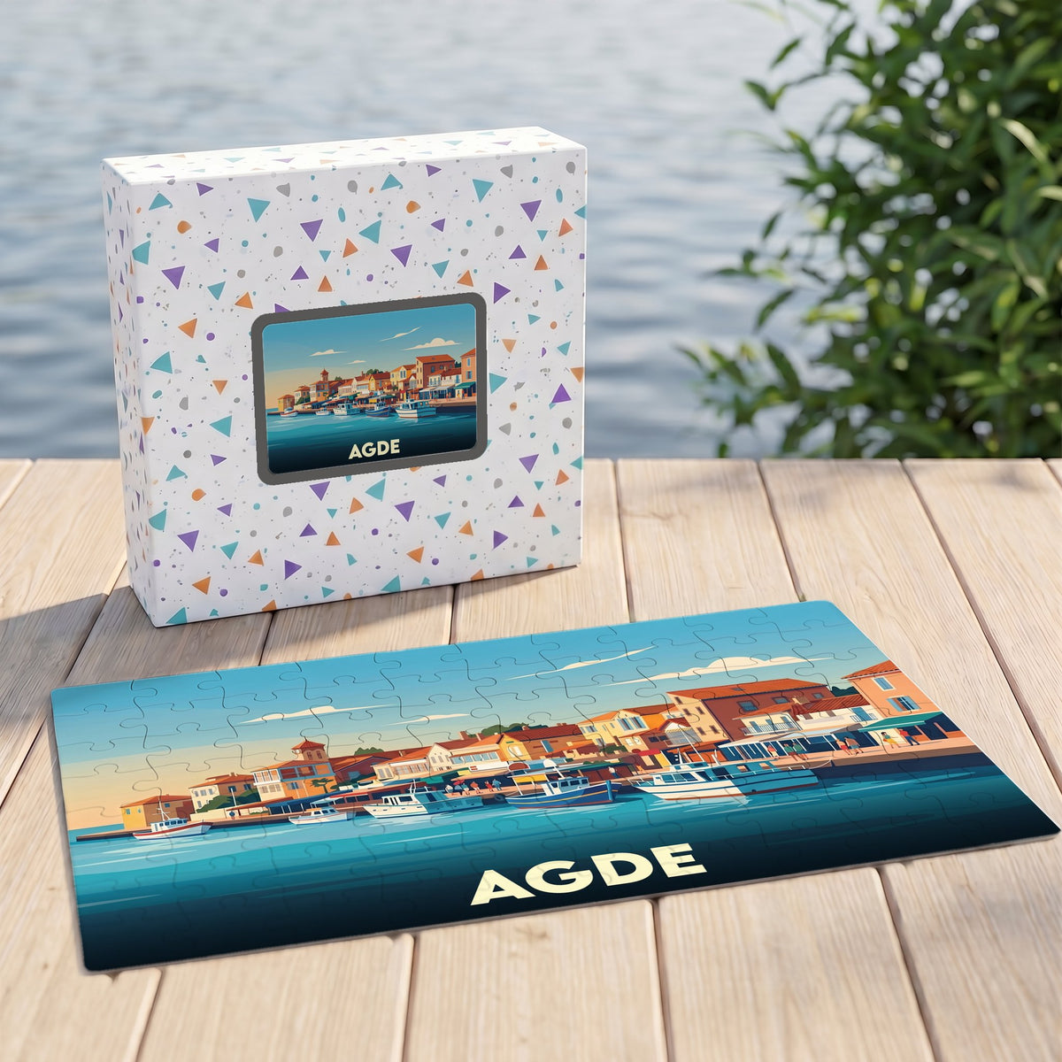 Puzzle souvenir de la ville d'Agde illustrant son port avec un style graphique épuré.
