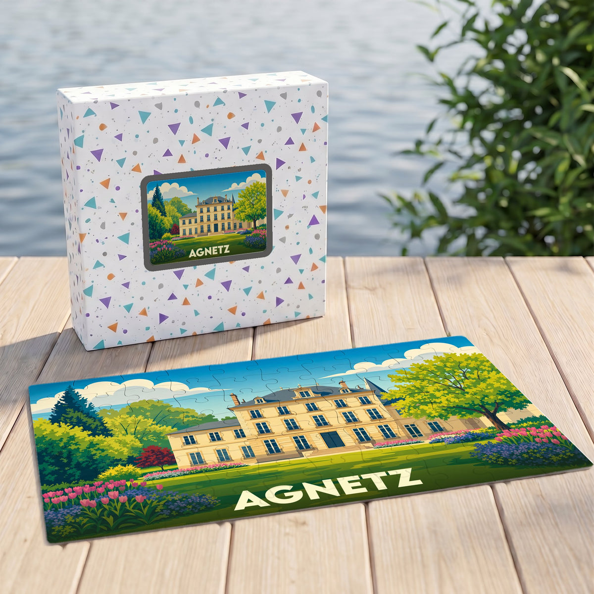 Puzzle souvenir de la ville d'Agnetz avec une illustration stylisée d'un château.