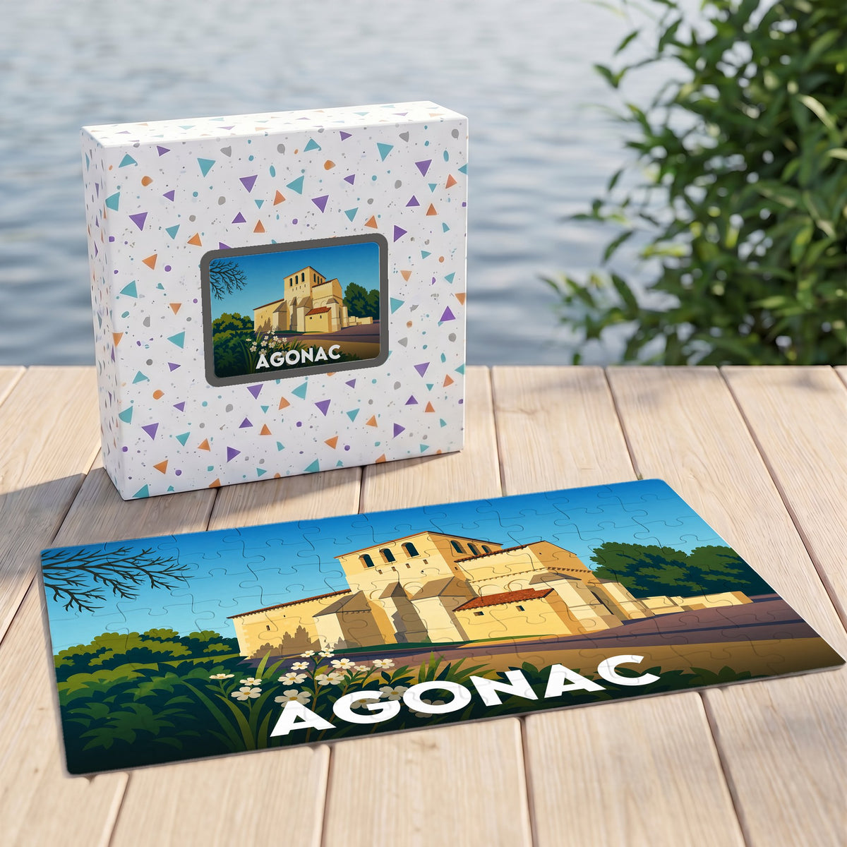 Puzzle souvenir de la ville d'Agonac avec une illustration stylisée.
