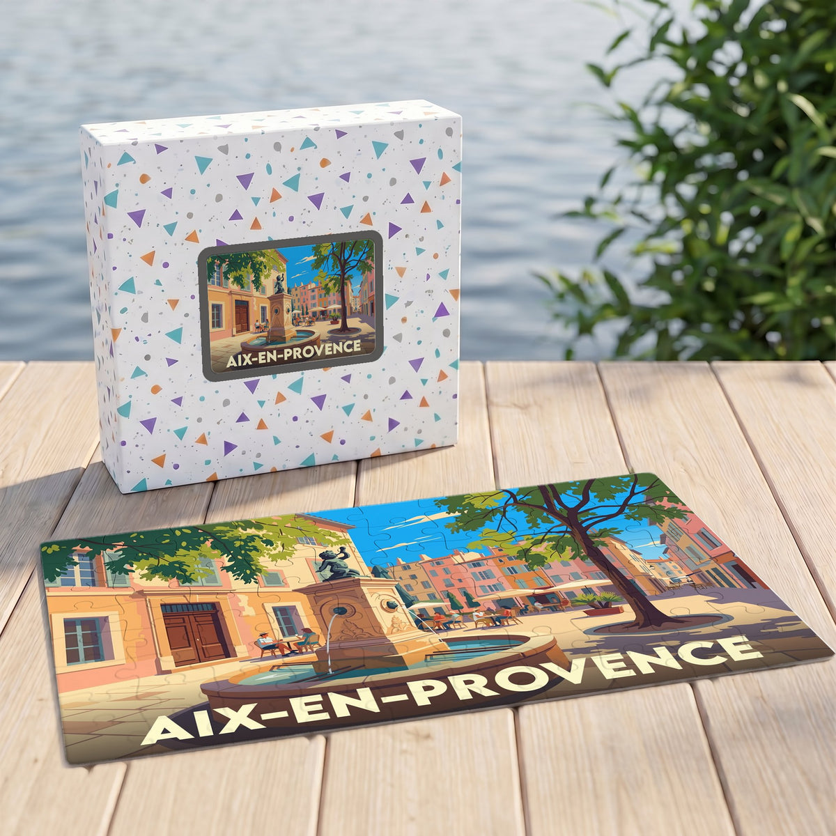 Puzzle souvenir de la ville d'Aix-en-Provence avec une illustration colorée d'une place et sa fontaine.
