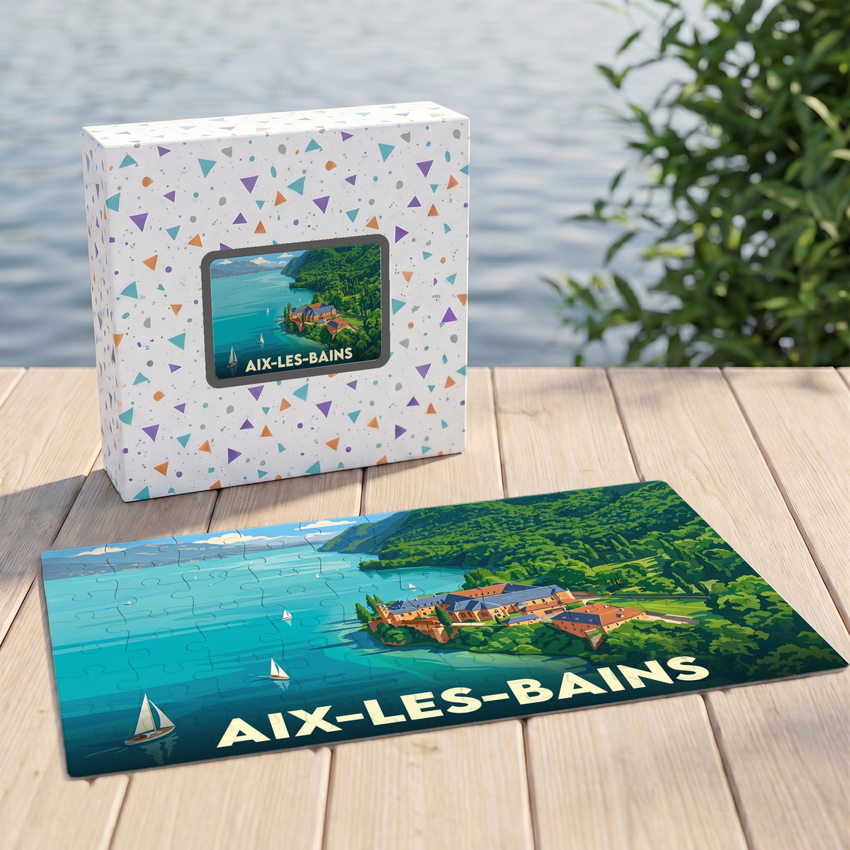Puzzle souvenir de la ville d'Aix-les-Bains avec une illustration stylisée du lac et de l'abbaye d'Hautecombe.