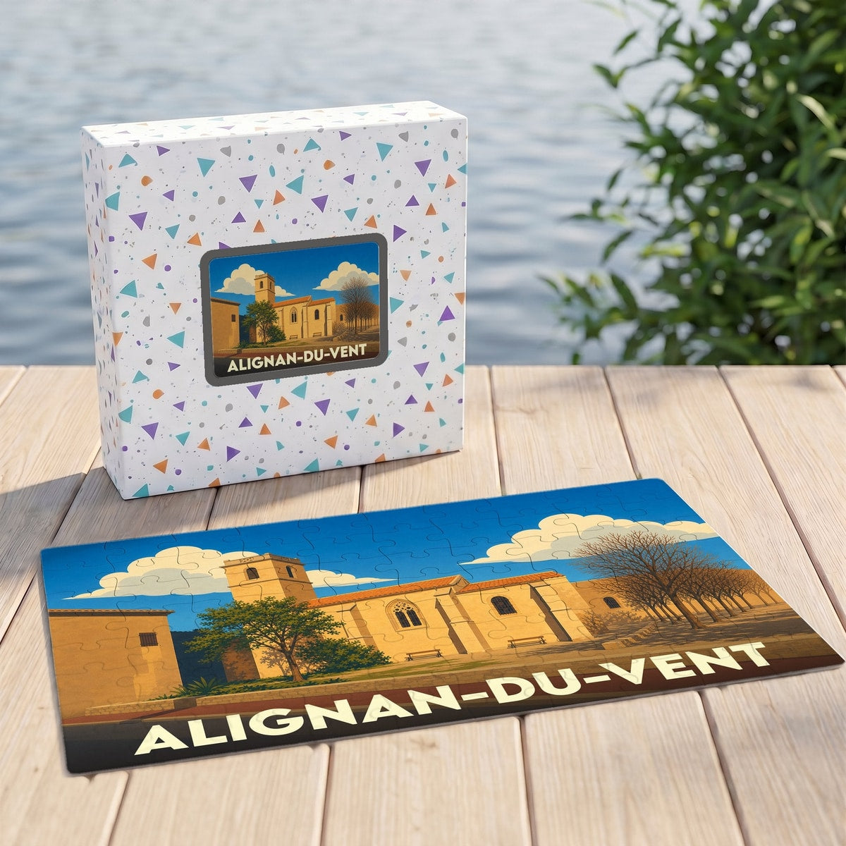 Puzzle souvenir de la ville d'Alignan-du-Vent avec une illustration stylisée de son église et de sa place.