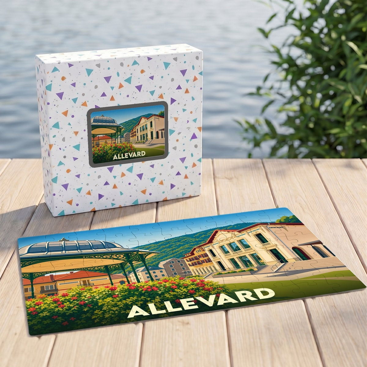 Puzzle souvenir de la ville d'Allevard présentant une illustration colorée et stylisée de son architecture.