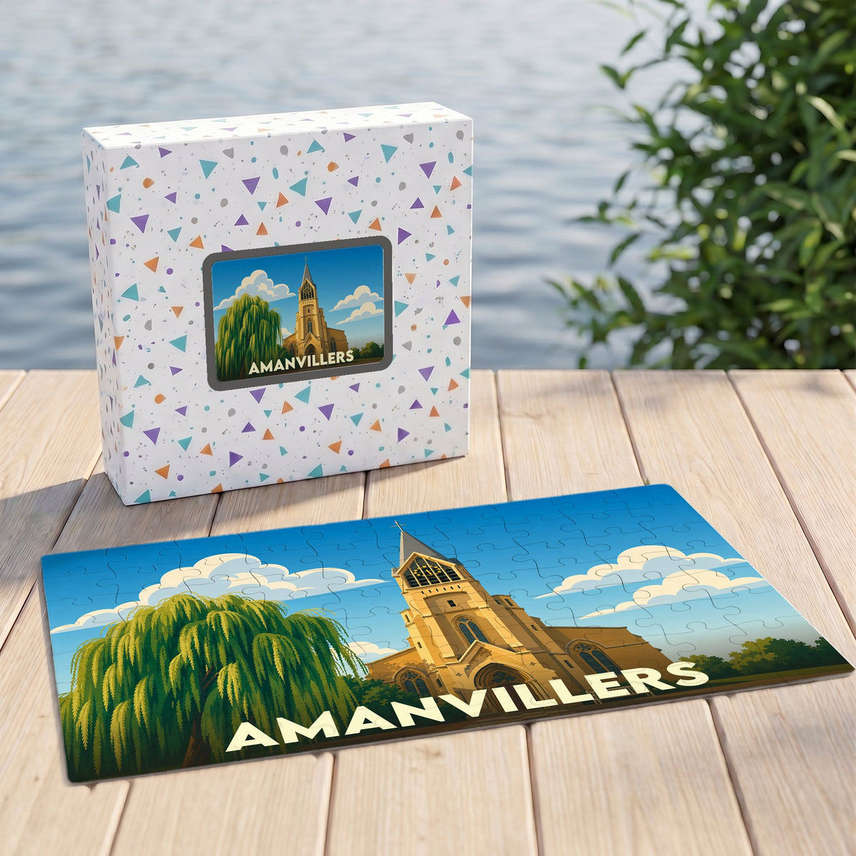 Puzzle souvenir de la ville d'Amanvillers illustrant son église et un saule pleureur dans un style graphique épuré.