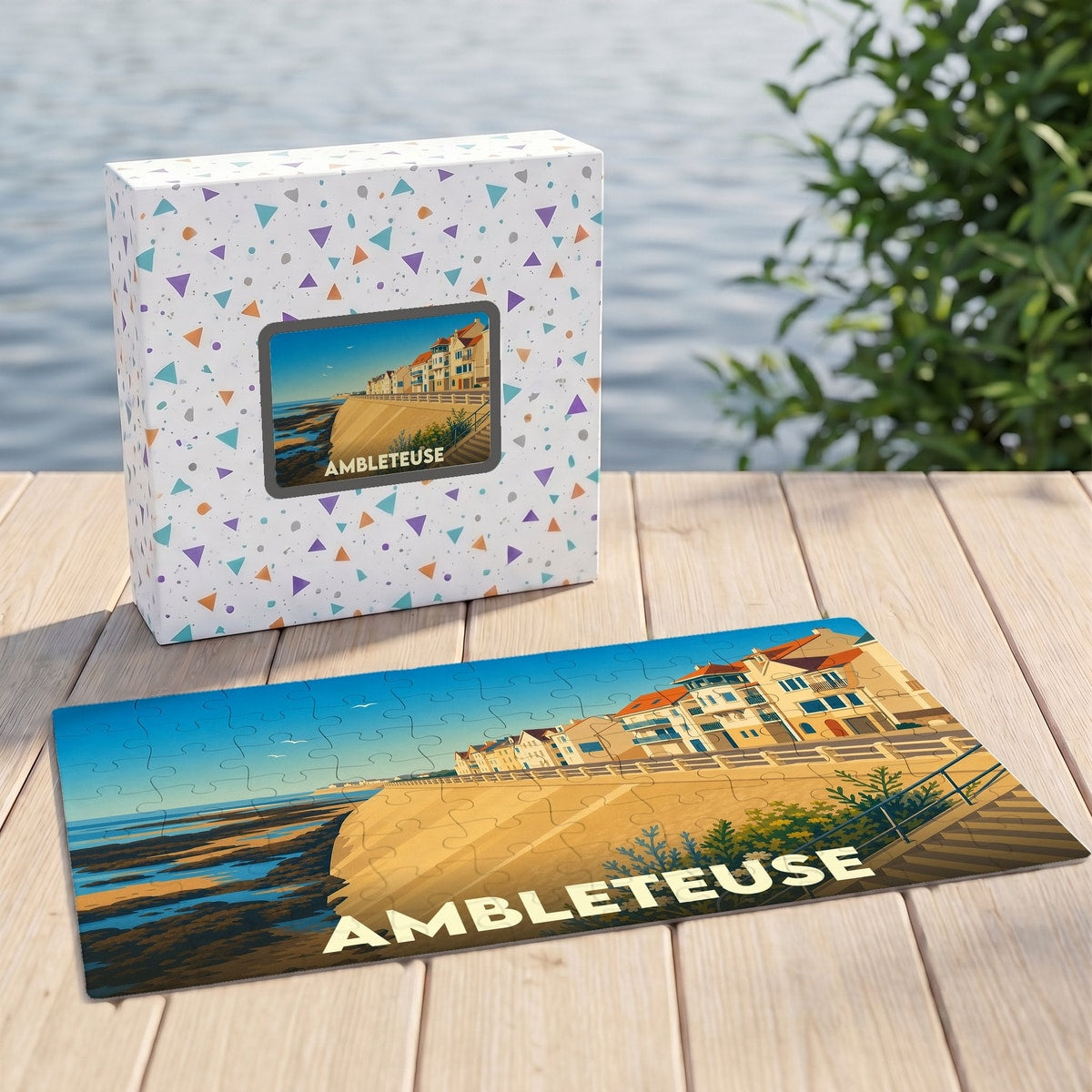 Puzzle souvenir de la ville d'Ambleteuse avec une illustration stylisée du front de mer et de ses maisons.
