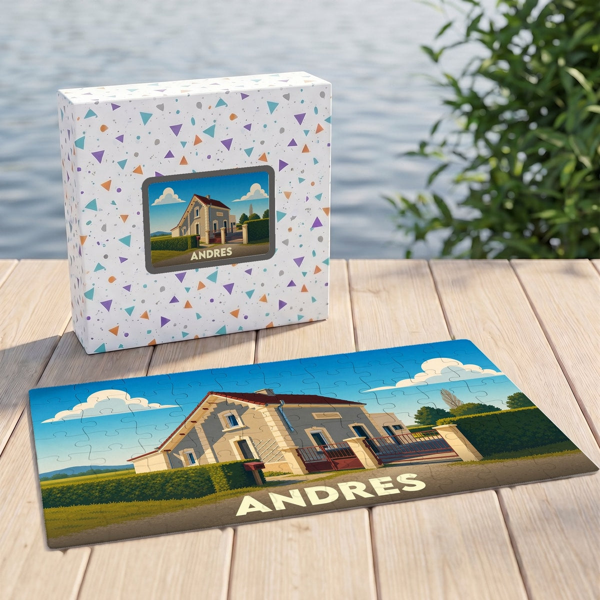 Puzzle souvenir de la ville d'Andres présentant une illustration stylisée d'une maison de campagne.