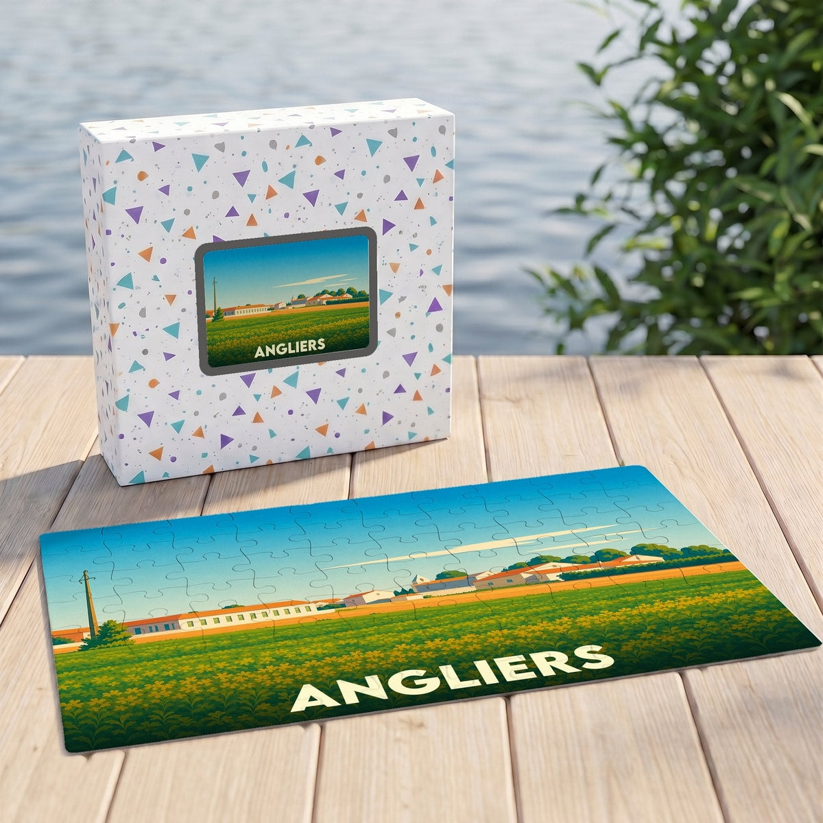 Puzzle souvenir de la ville d'Angliers illustrant un paysage champêtre coloré.