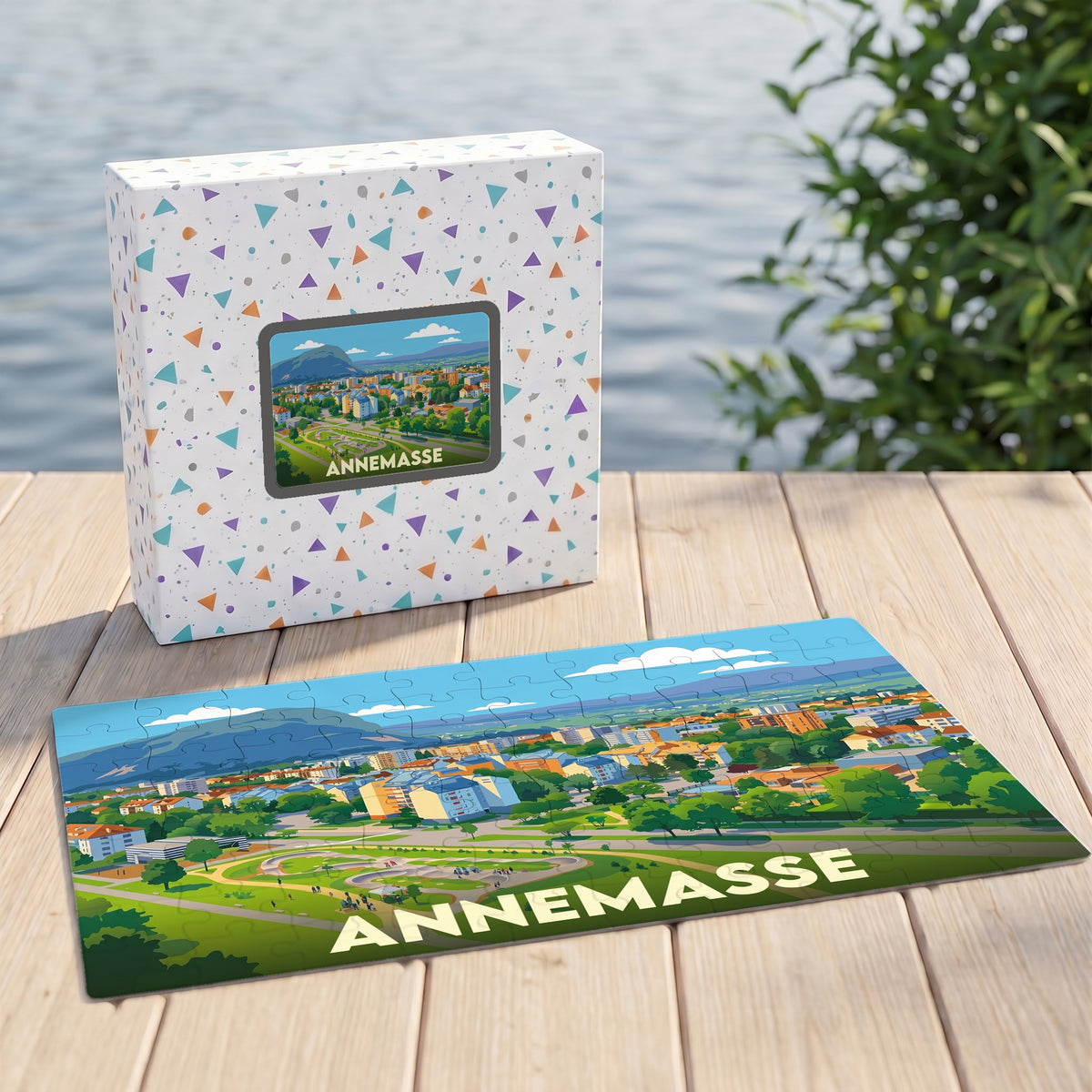 Puzzle souvenir de la ville d'Annemasse illustré d'un panorama urbain coloré au pied des montagnes.