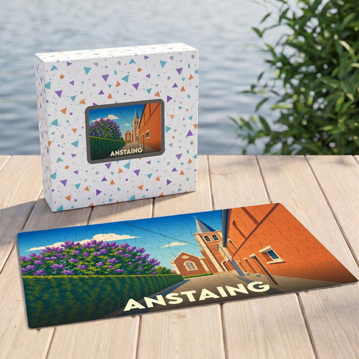 Puzzle souvenir de la ville d'Anstaing avec une illustration colorée et stylisée de son église.