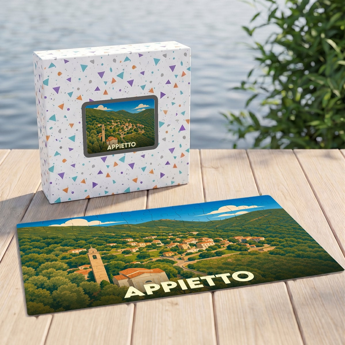 Puzzle souvenir de la ville d'Appietto illustrant un village corse niché dans la végétation.