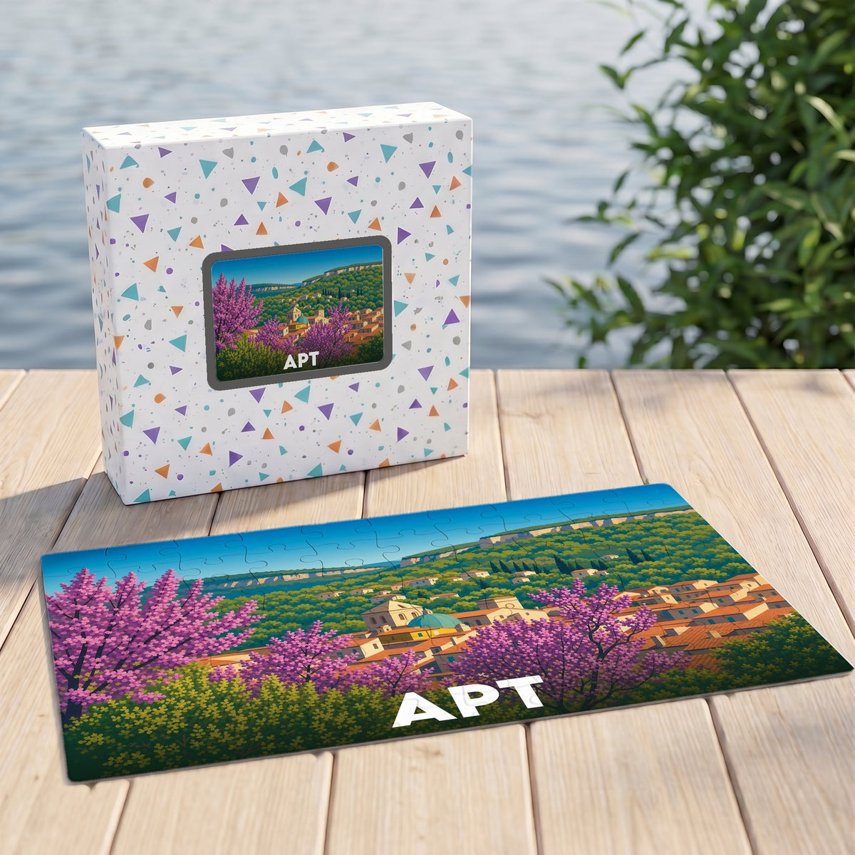 Puzzle souvenir de la ville d'Apt avec une illustration stylisée et colorée.