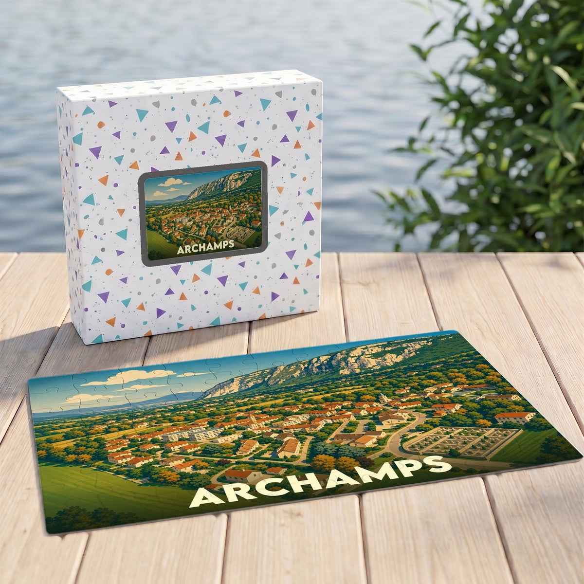 Puzzle souvenir de la ville d'Archamps avec une illustration stylisée et sa boîte assortie.