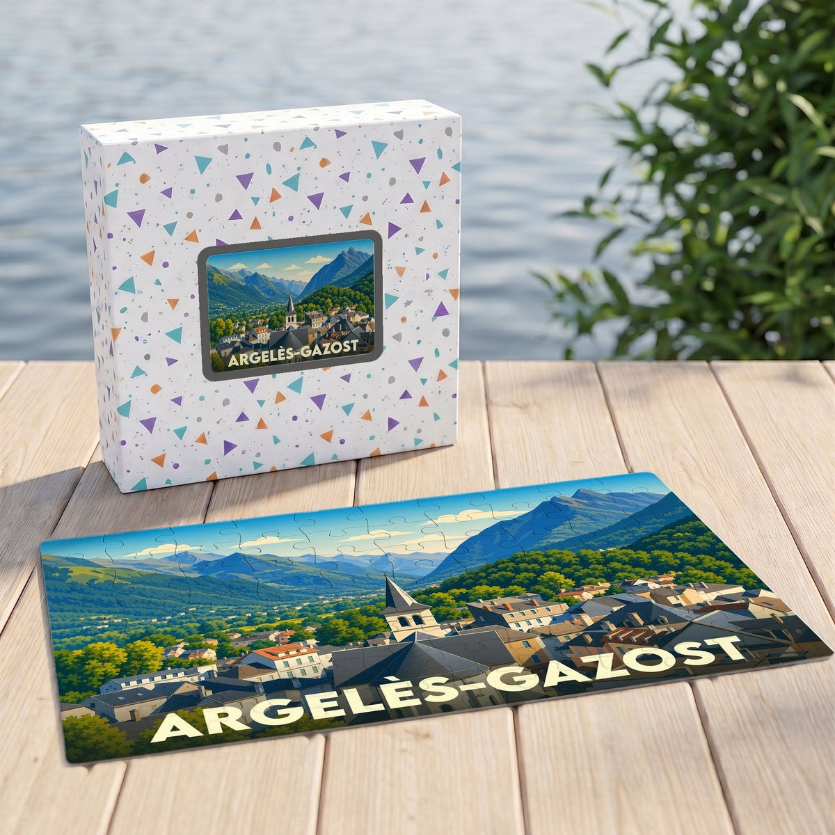Puzzle souvenir de la ville d'Argelès-Gazost avec une illustration stylisée de ses paysages montagneux.