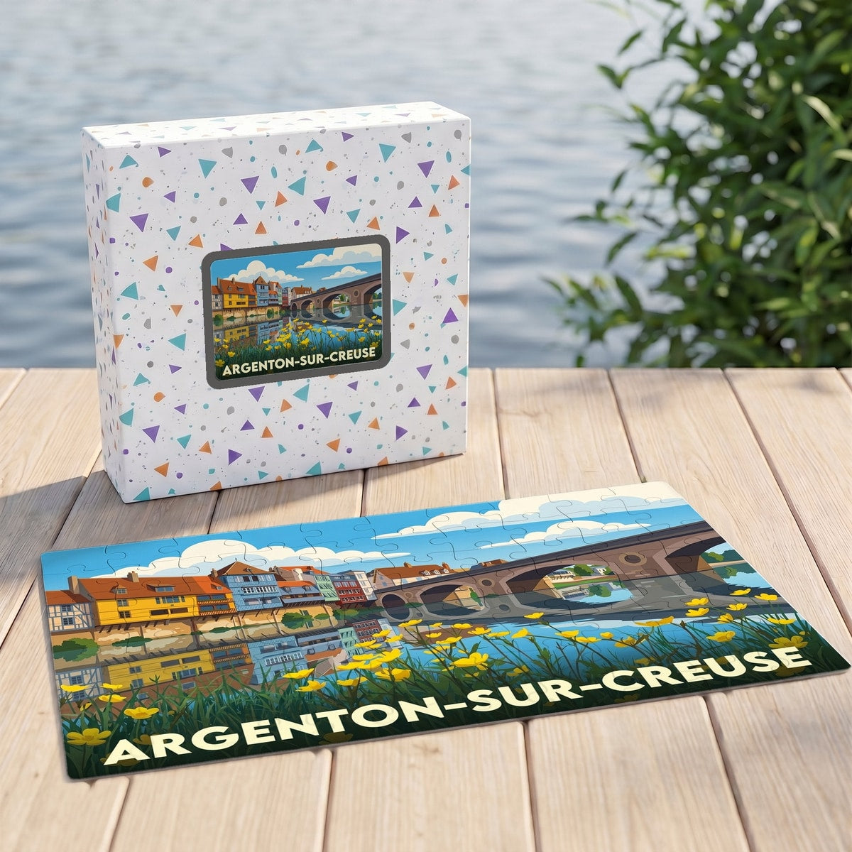 Puzzle souvenir de la ville d'Argenton-sur-Creuse avec une illustration stylisée de ses maisons colorées et de son vieux pont.