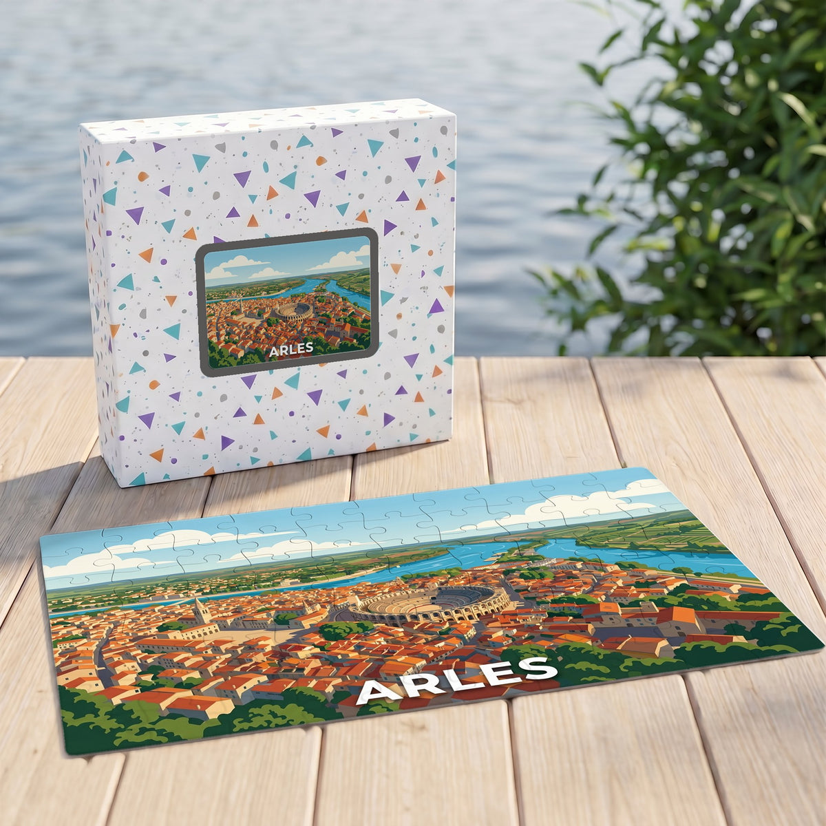 Puzzle souvenir de la ville d'Arles avec une illustration panoramique stylisée de ses arènes et du Rhône.