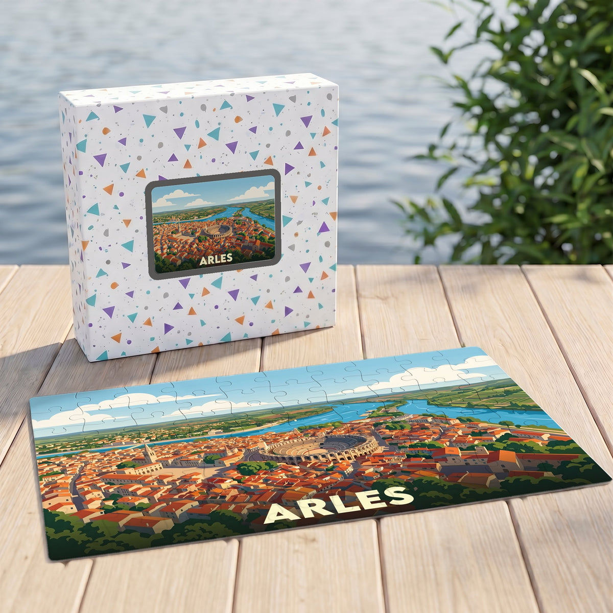 Puzzle souvenir de la ville d'Arles avec une illustration panoramique stylisée de ses arènes et du Rhône.