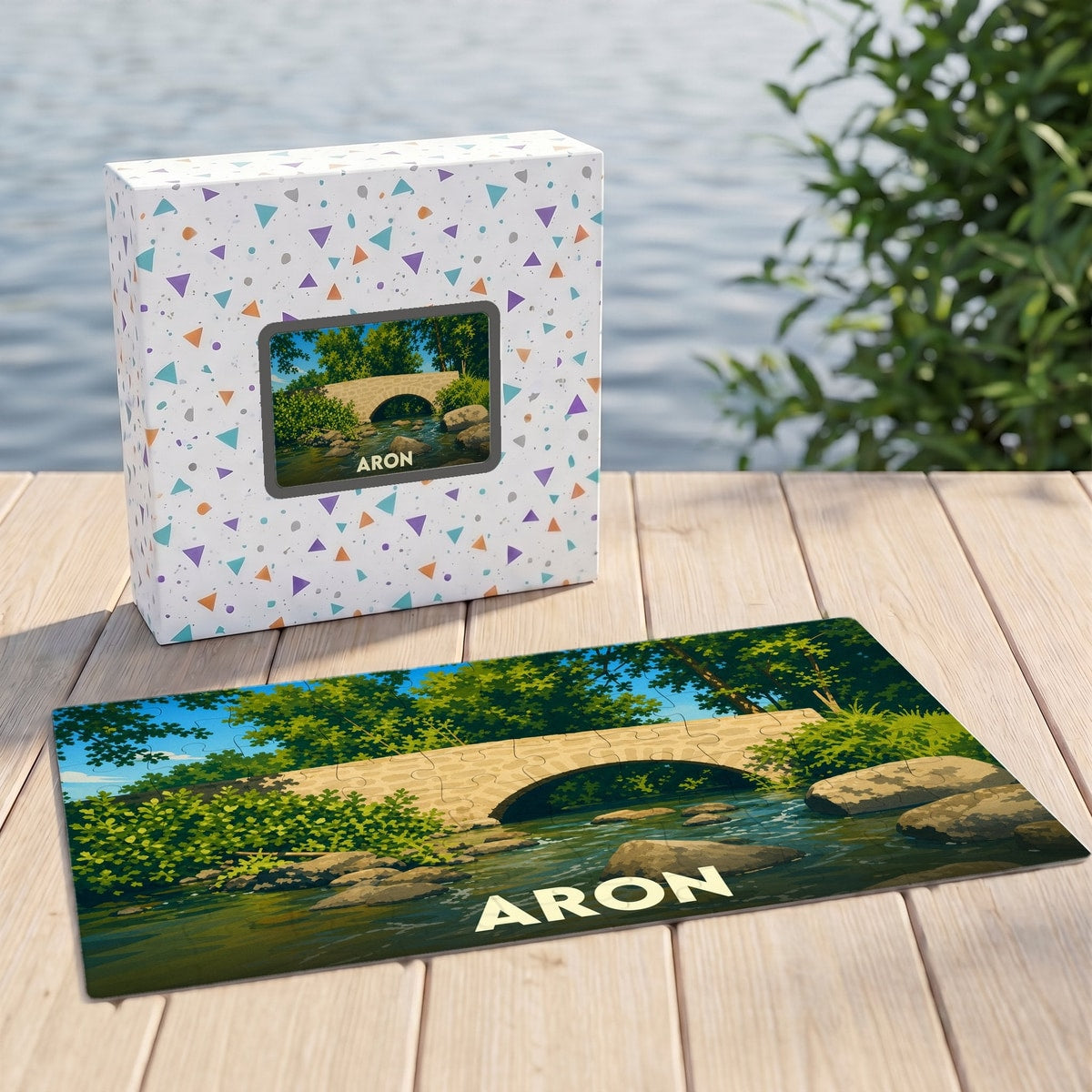 Puzzle souvenir de la ville de Aron avec une illustration stylisée d'un pont en pierre.