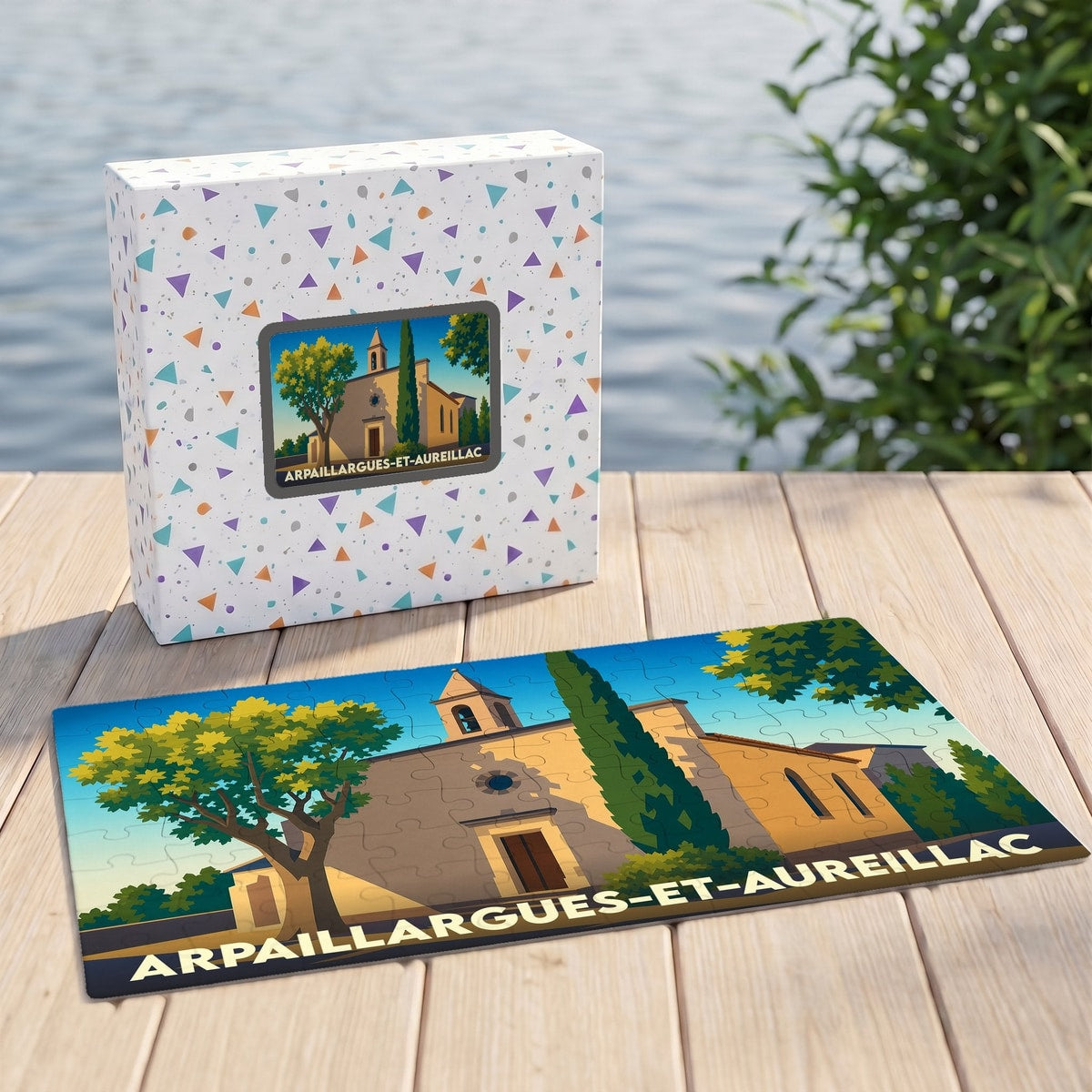 Puzzle souvenir de la ville de Arpaillargues-et-Aureillac illustrant une église provençale sous un ciel bleu.