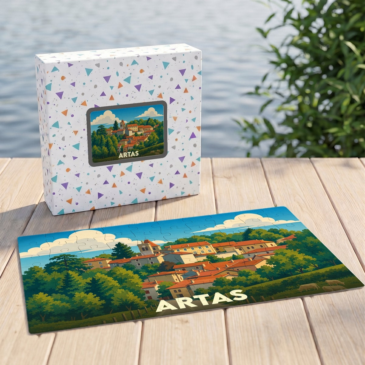 Puzzle souvenir de la ville d'Artas avec une illustration stylisée d'un paysage urbain niché dans la verdure.
