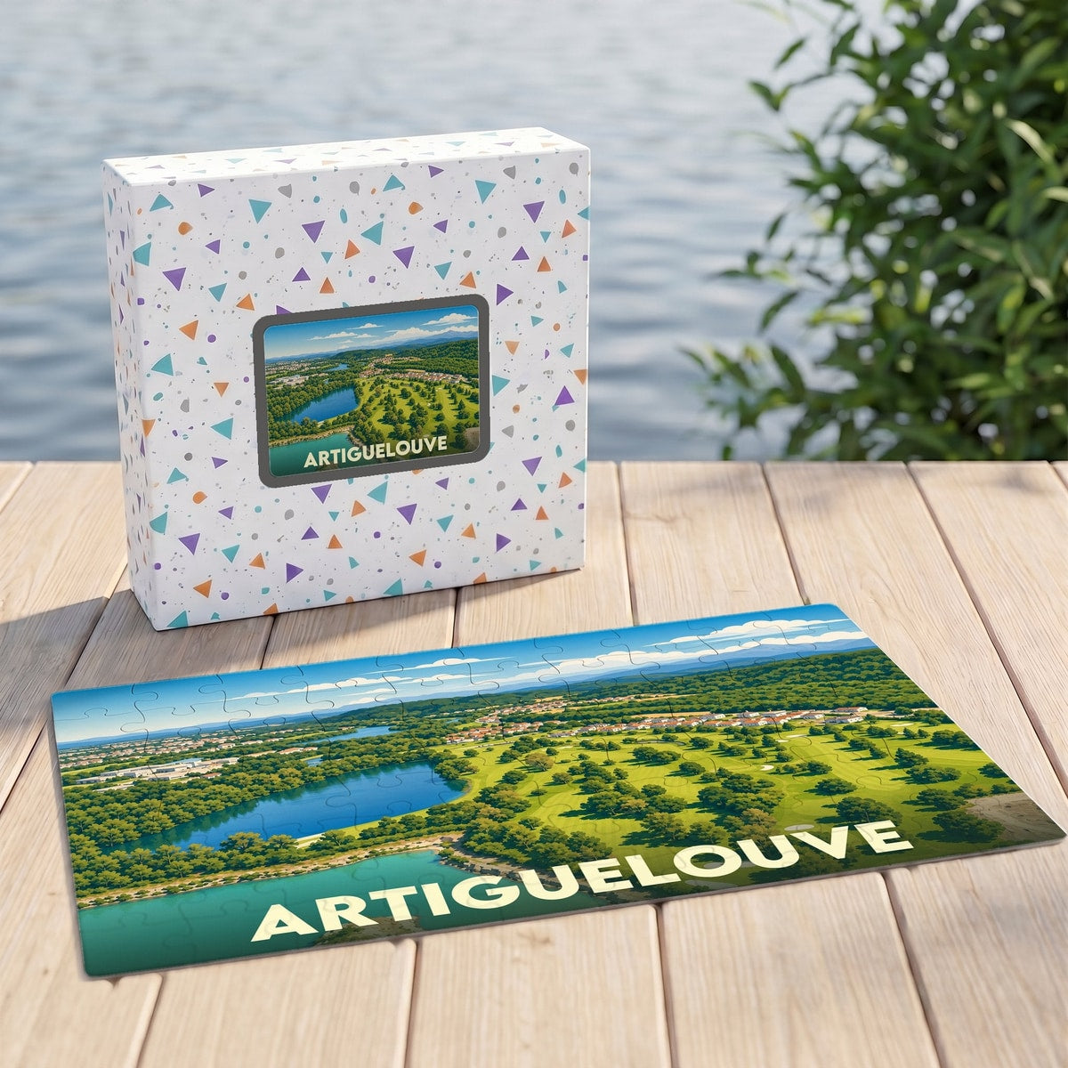 Puzzle souvenir de la ville d'Artiguelouve représentant un paysage de golf et de lac sous forme d'illustration stylisée.
