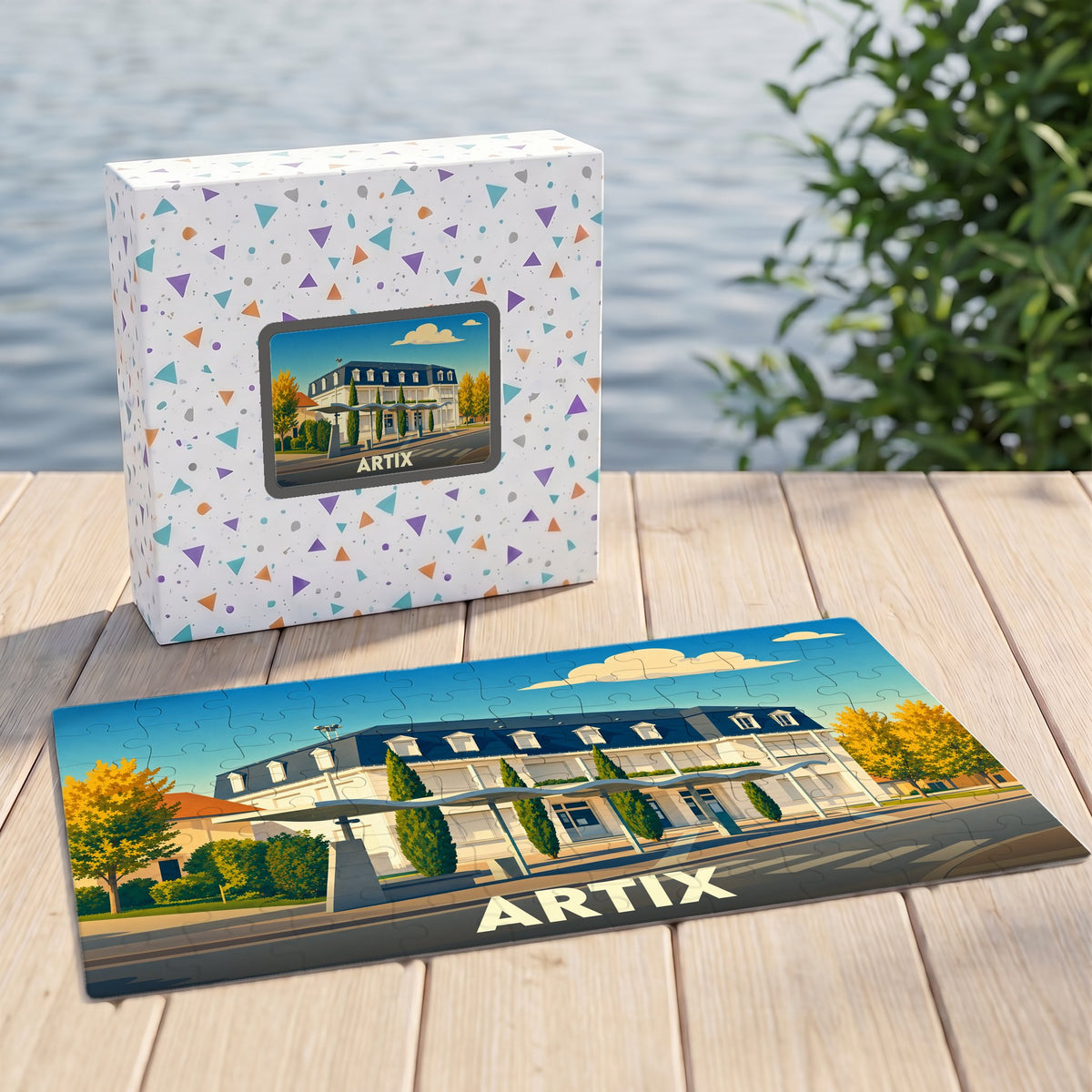 Puzzle souvenir de la ville d'Artix avec une illustration stylisée d'un bâtiment emblématique.