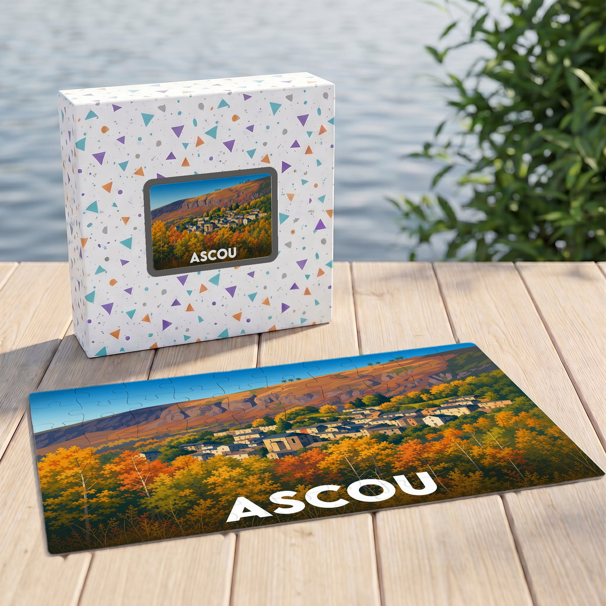 Puzzle souvenir de la commune d'Ascou avec une illustration de ses paysages montagneux en automne.