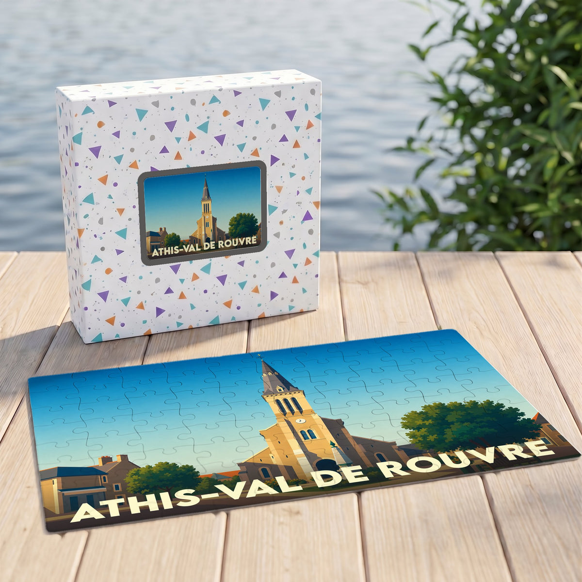 Puzzle souvenir de la ville de Athis-Val de Rouvre présentant une illustration stylisée de son église.