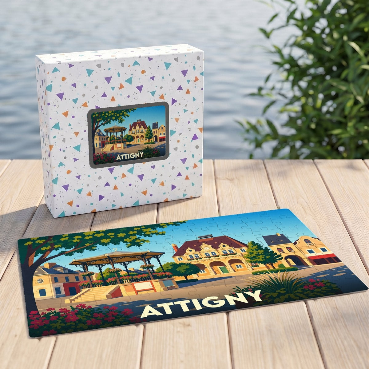 Puzzle souvenir de la ville d'Attigny avec une illustration stylisée d'une place arborée et son kiosque.