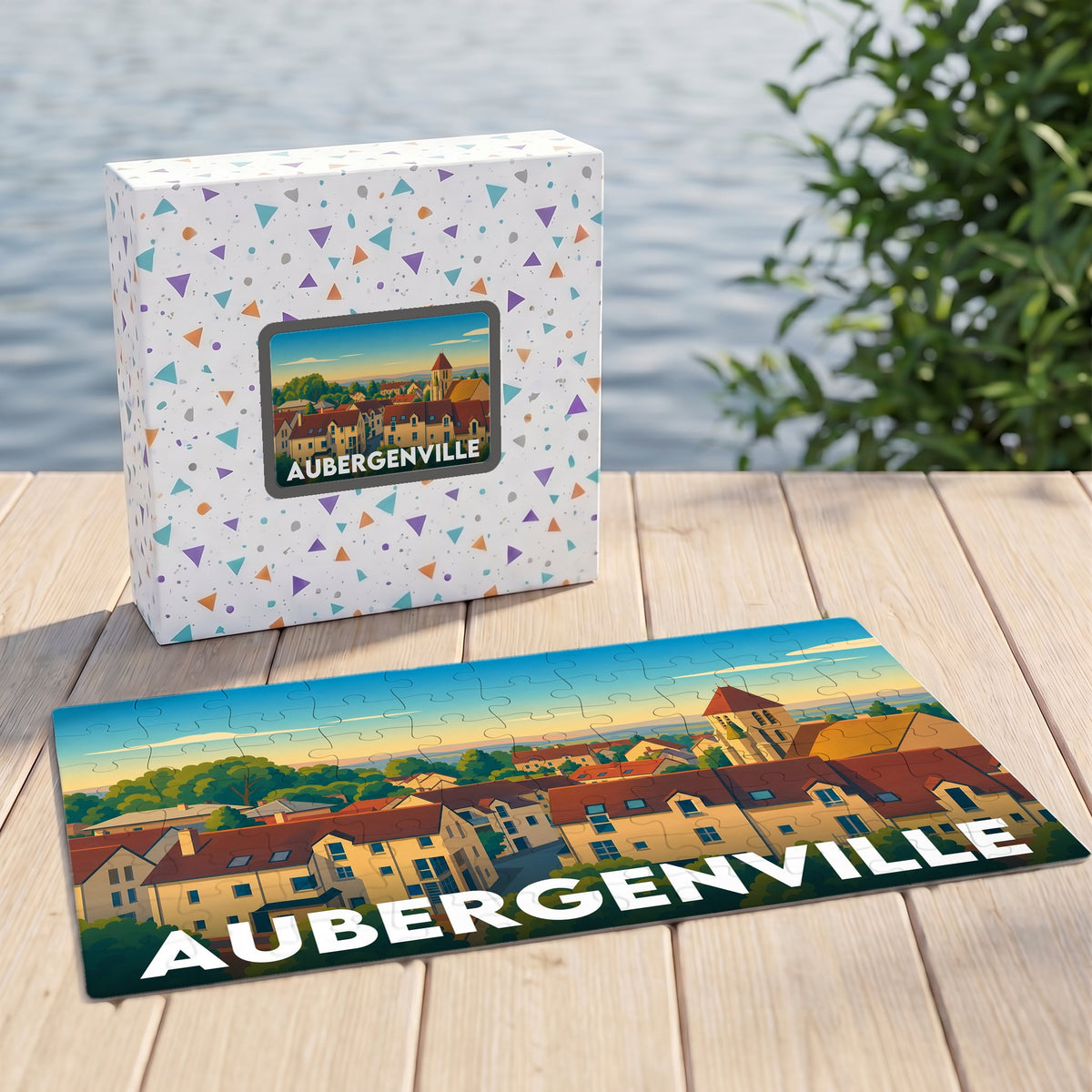 Puzzle souvenir de la ville d'Aubergenville avec une illustration stylisée de ses paysages et habitations.