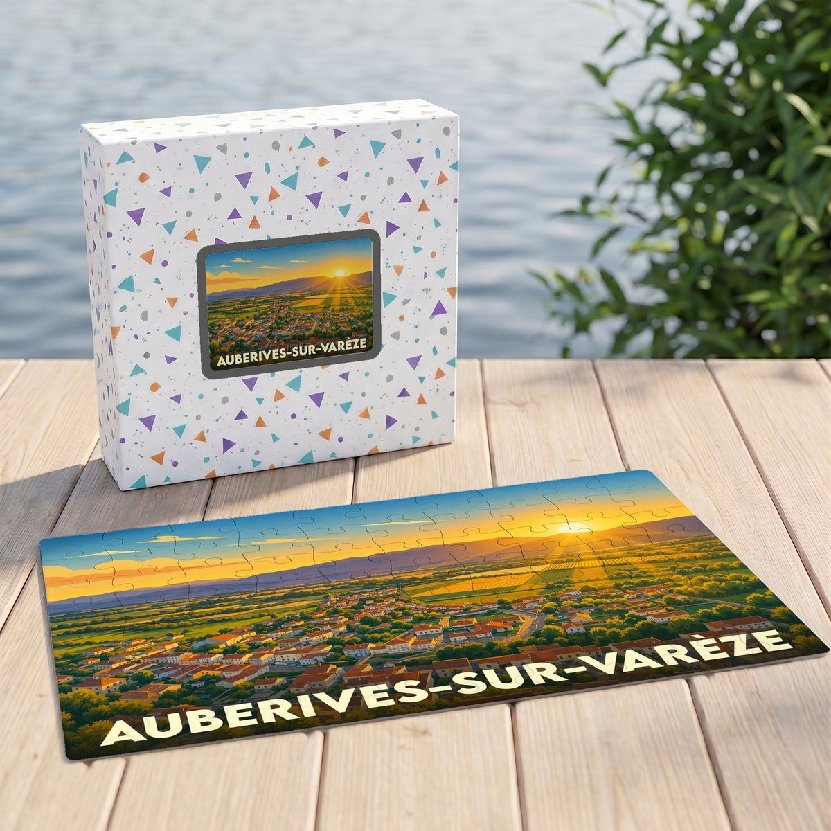 Puzzle souvenir de la ville d'Auberives-sur-Varèze avec une illustration stylisée d'un paysage au soleil couchant.