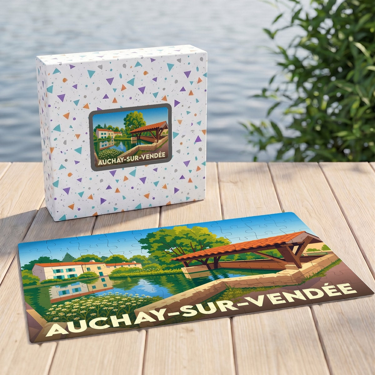 Puzzle souvenir de la ville de Auchay-sur-Vendée avec une illustration stylisée et colorée.