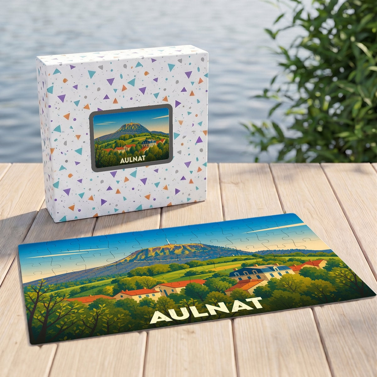 Puzzle souvenir de la ville d'Aulnat présentant une illustration stylisée de son paysage et de ses environs.