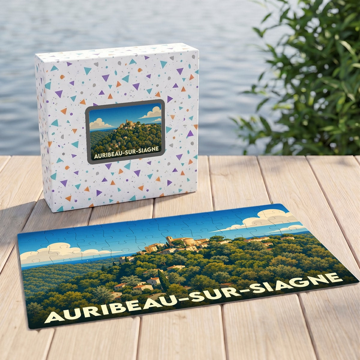 Puzzle souvenir de la ville de Auribeau-sur-Siagne avec une illustration stylisée de son village perché.