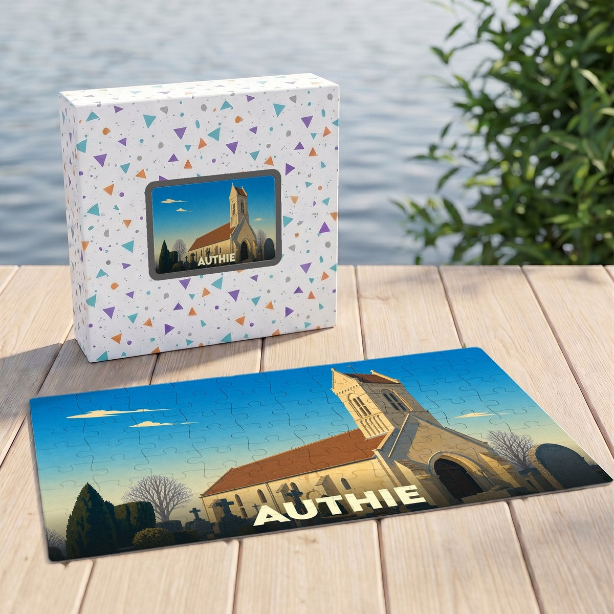 Puzzle souvenir de la ville d'Authie avec une illustration stylisée de son église.