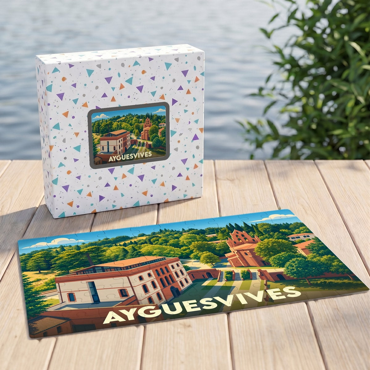 Puzzle souvenir de la ville d'Ayguesvives présentant une illustration colorée et stylisée de son paysage urbain.