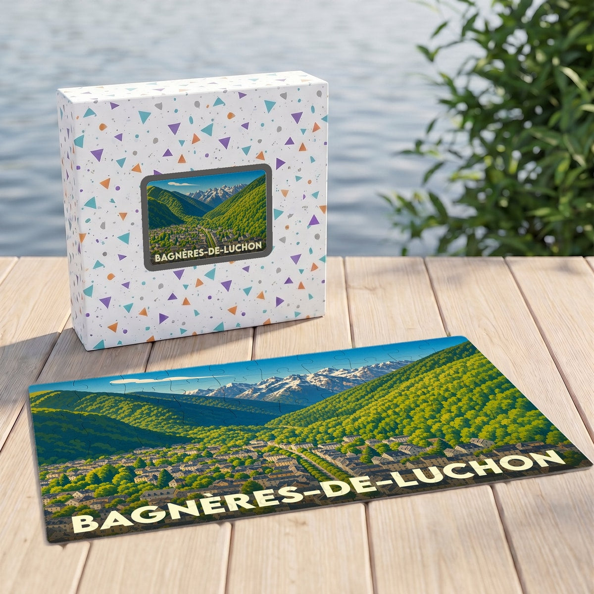 Puzzle souvenir de la ville de Bagnères-de-Luchon avec une illustration panoramique des montagnes pyrénéennes.