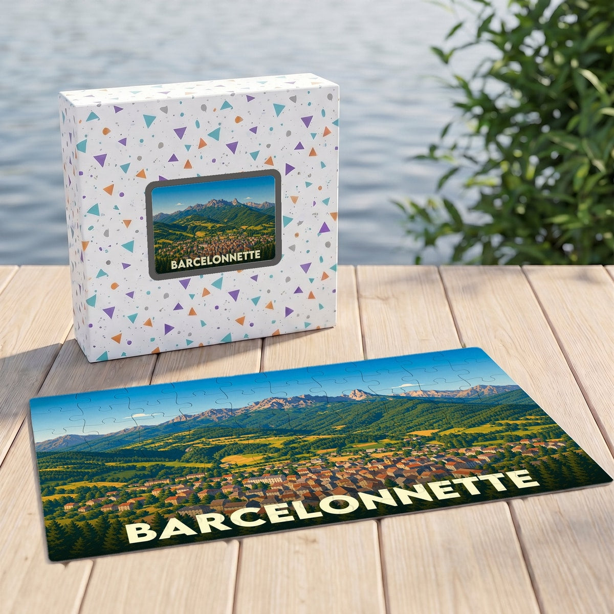 Puzzle souvenir de la ville de Barcelonnette présentant une vue panoramique illustrée de la vallée et des montagnes.