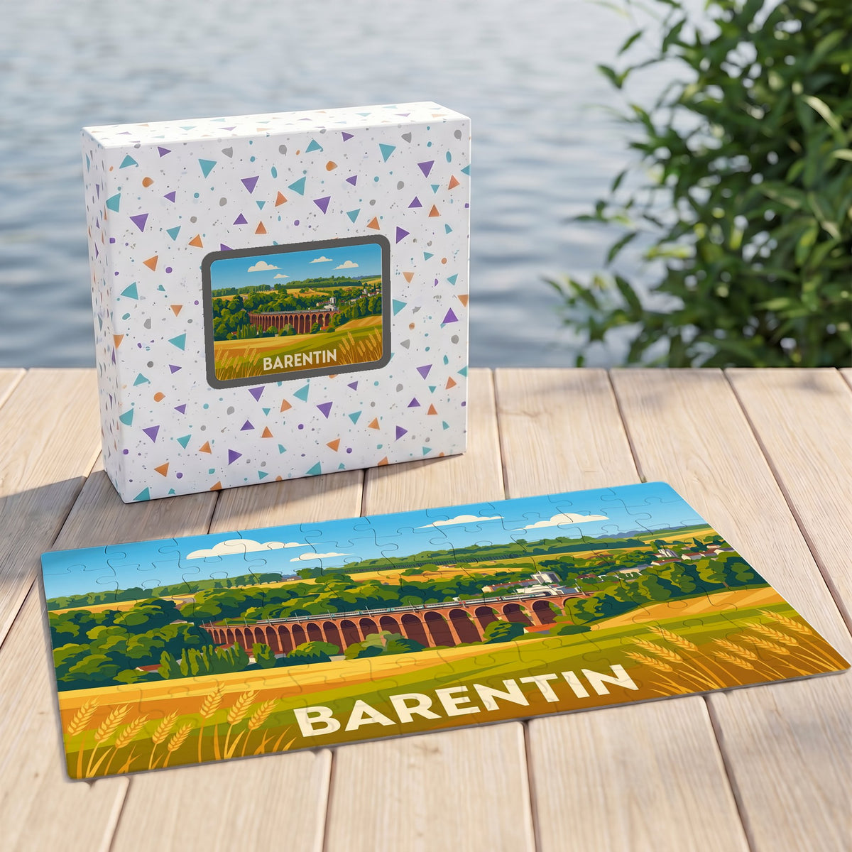 Puzzle souvenir de la ville de Barentin illustré d'un viaduc et de champs dorés.