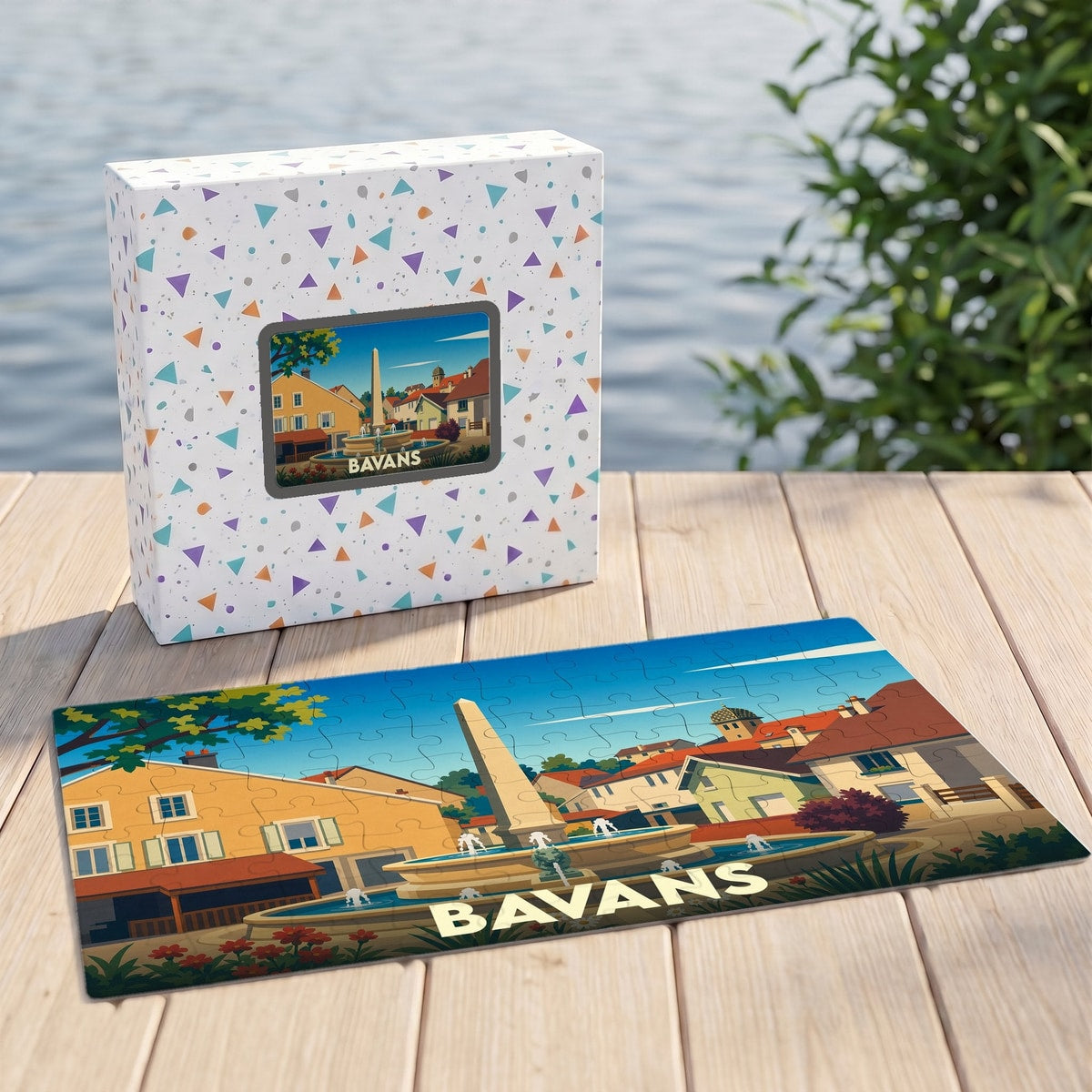 Puzzle souvenir de la ville de Bavans avec une illustration stylisée d'une fontaine et son coffret assorti.