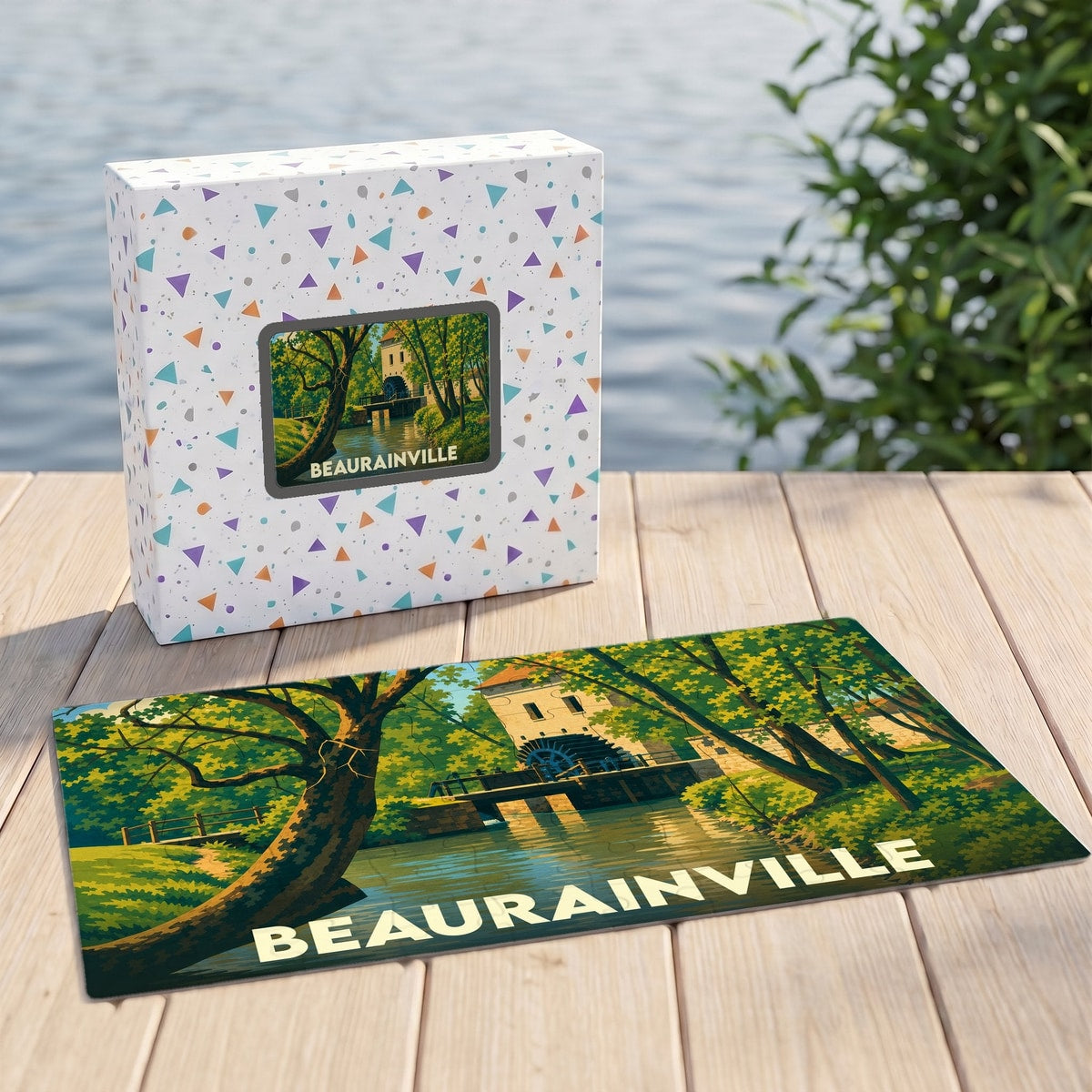 Puzzle souvenir de la ville de Beaurainville avec une illustration stylisée d'un moulin au bord de l'eau.