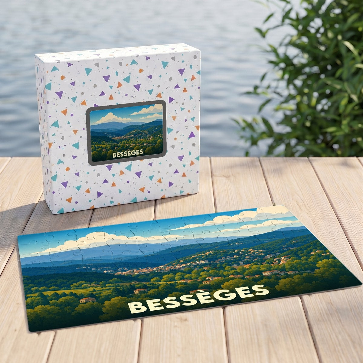 Puzzle souvenir de la ville de Bessèges avec une illustration de paysage vallonné dans sa boîte assortie.