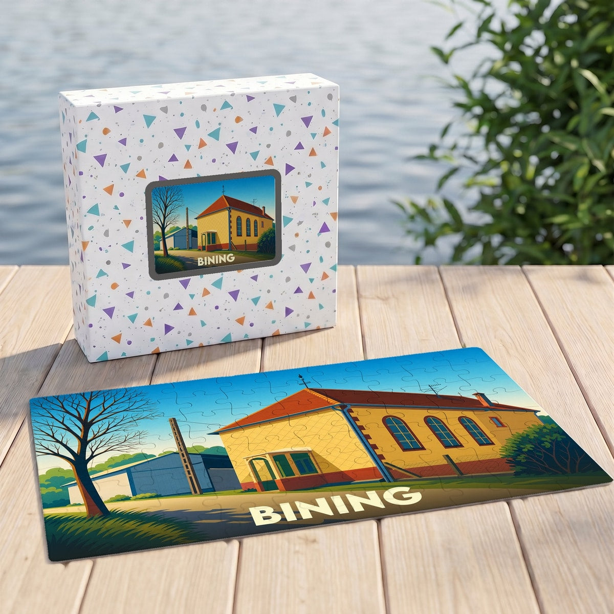 Puzzle souvenir de la ville de Bining avec une illustration stylisée d'un bâtiment jaune sous un ciel bleu.