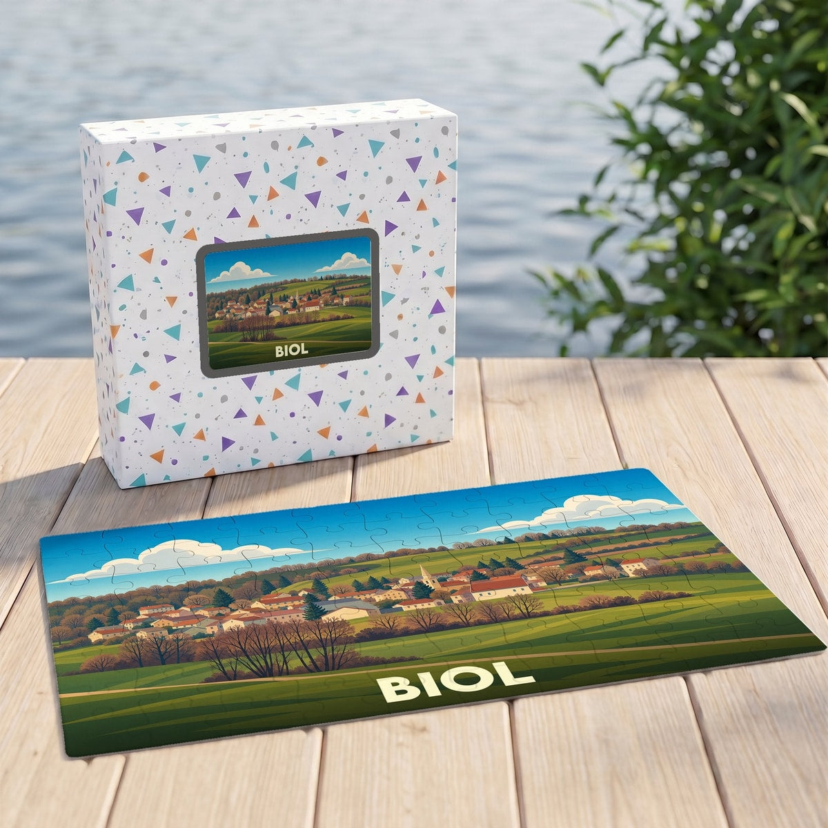 Puzzle souvenir de la ville de Biol illustré d'un paysage champêtre.