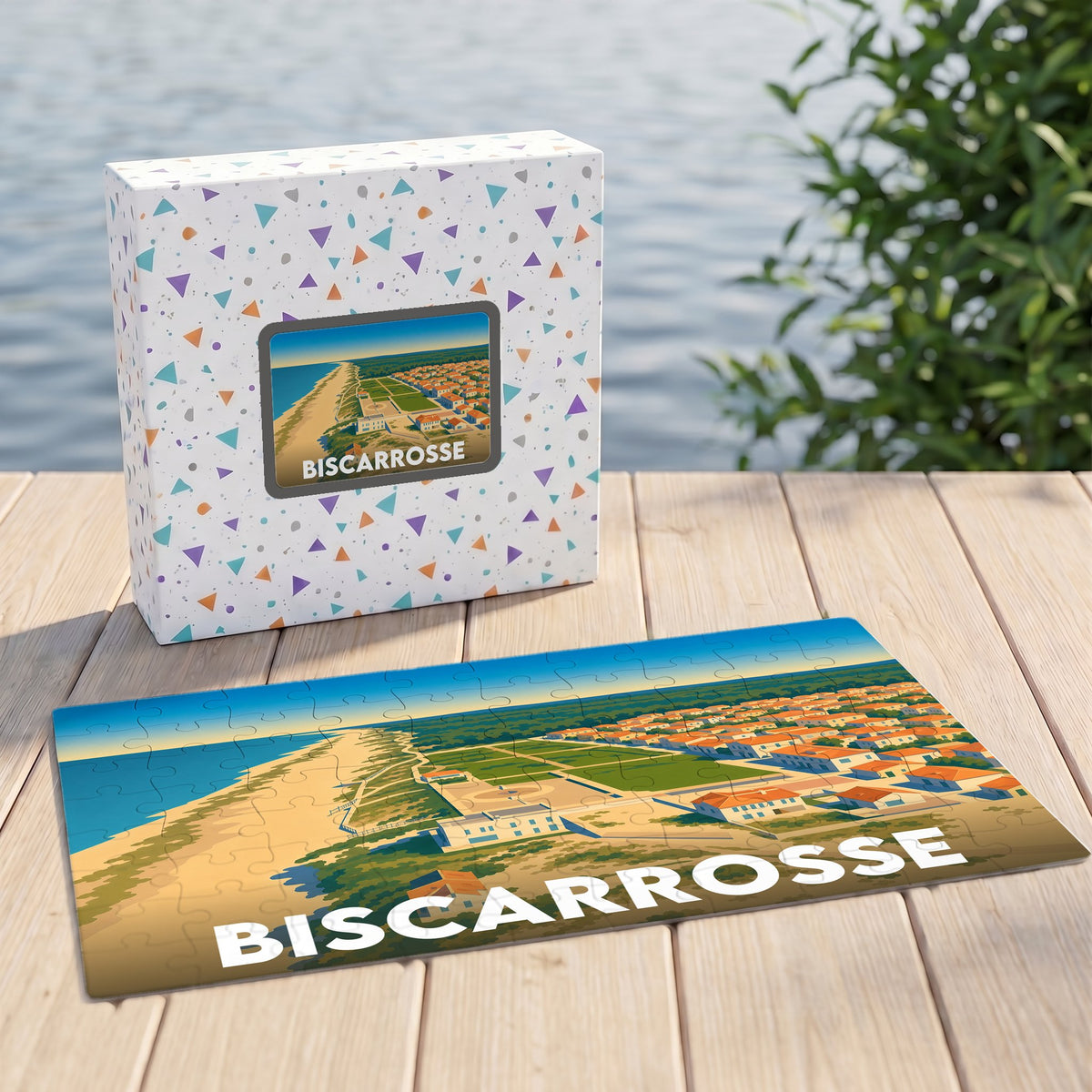 Puzzle souvenir de la ville de Biscarrosse avec une illustration stylisée du littoral et de ses habitations.