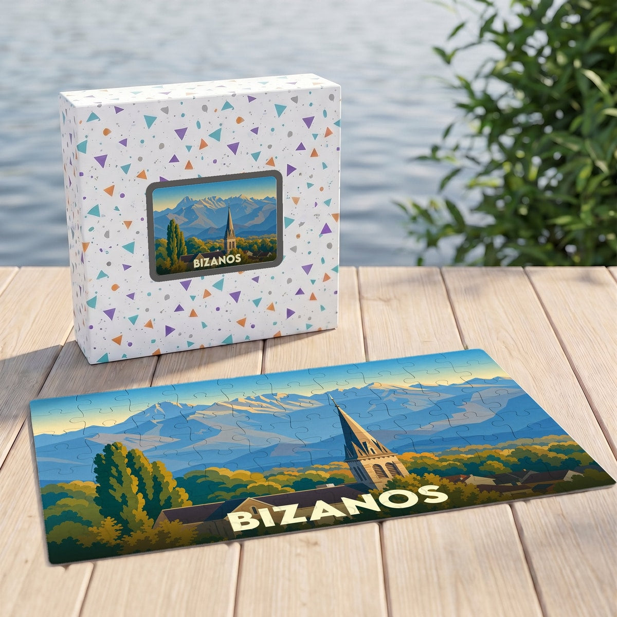 Puzzle souvenir de la ville de Bizanos avec une illustration stylisée de son clocher face aux montagnes.